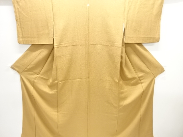 のり散らし模様織り出し一つ紋色無地着物